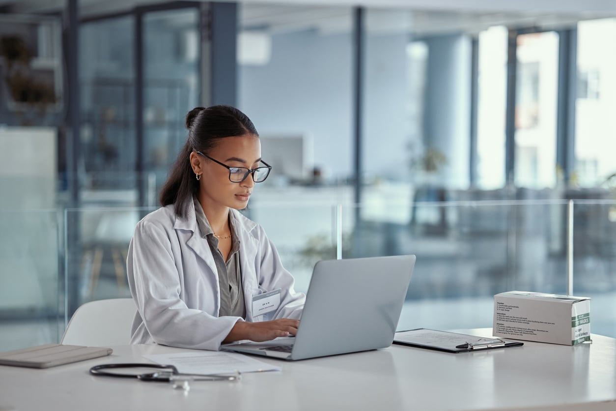 Female doctor on computer